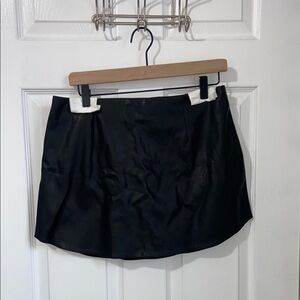 ASOS Design faux leather curved hem mini skirt